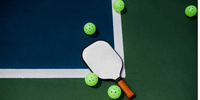 Why Pickleball Balls Are Different from Other Racquet and Paddle Sport Balls